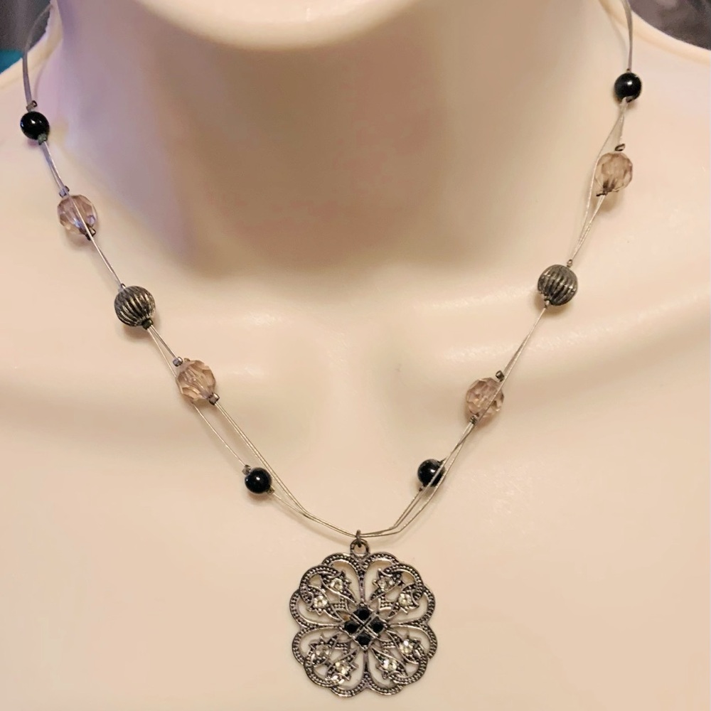Medallion Necklace On a Wire String. 16 inches.